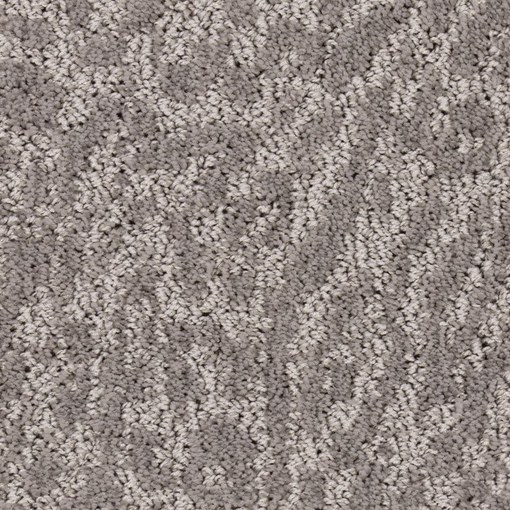 Close-up of light gray textured carpet
