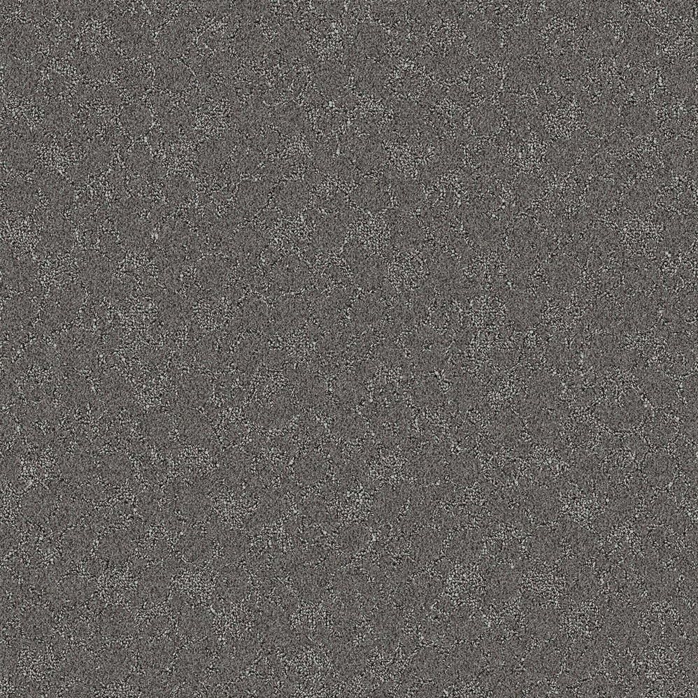 Gray textured carpet with subtle circular pattern