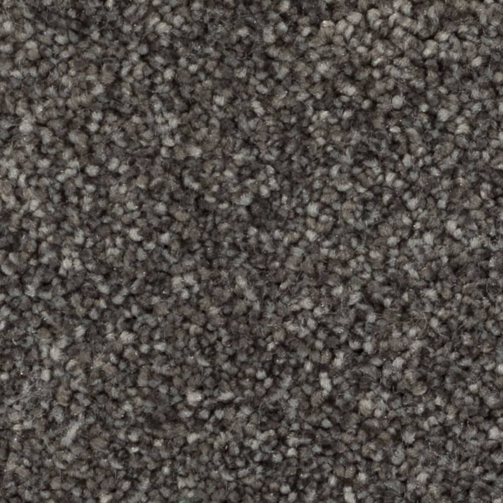 Close-up of gray textured carpet fibers