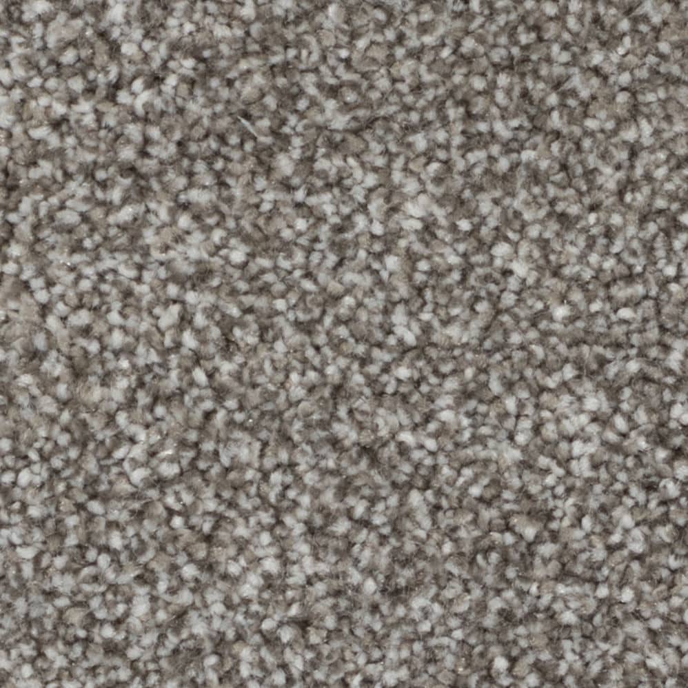 Close-up of gray textured carpet fibers