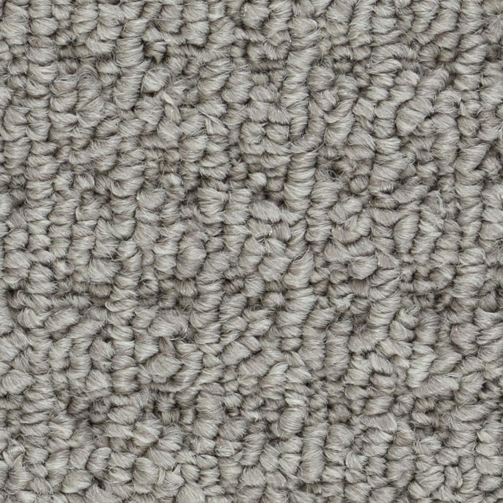 Close-up of gray textured carpet fibers
