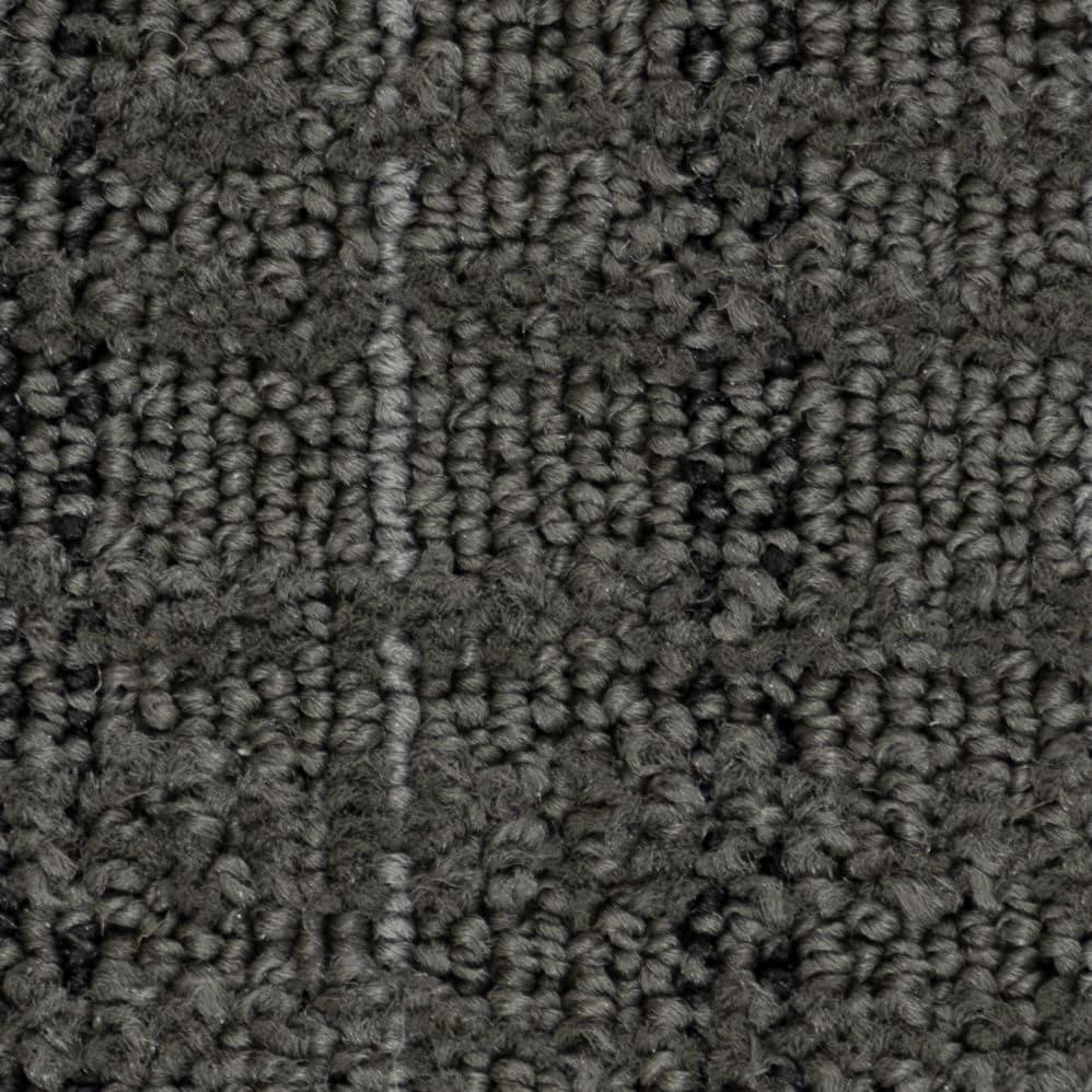 Close-up of dark gray textured carpet fibers