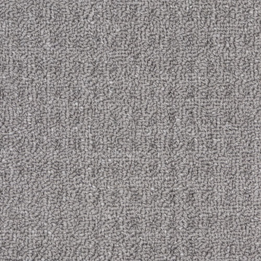 Close-up of gray textured carpet surface