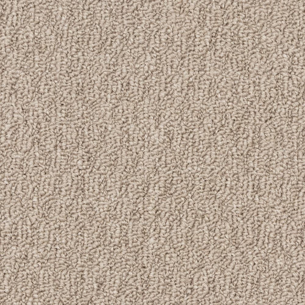 Close-up of beige textured carpet surface