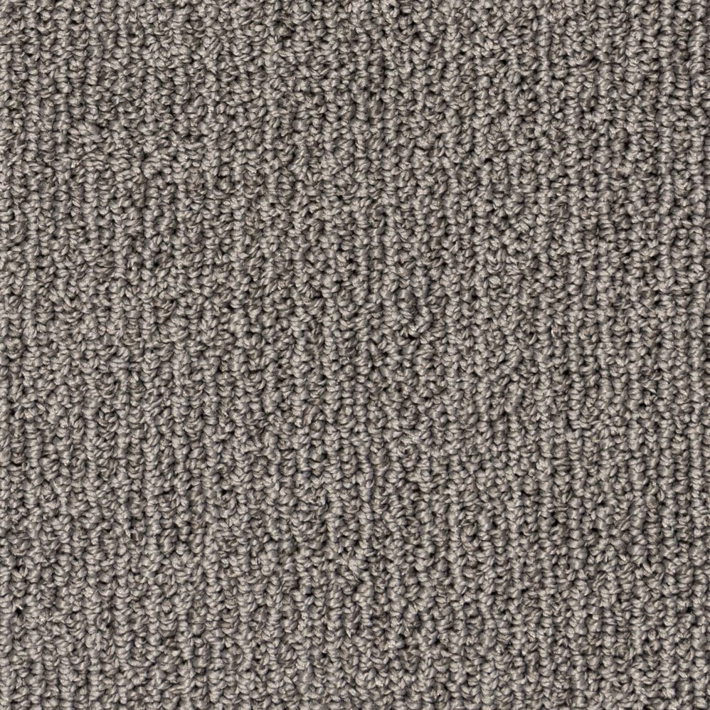Close-up of gray textured carpet surface