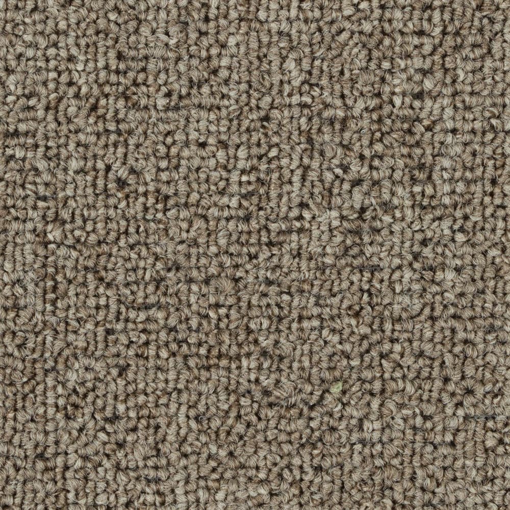 Close-up of brown textured carpet fibers