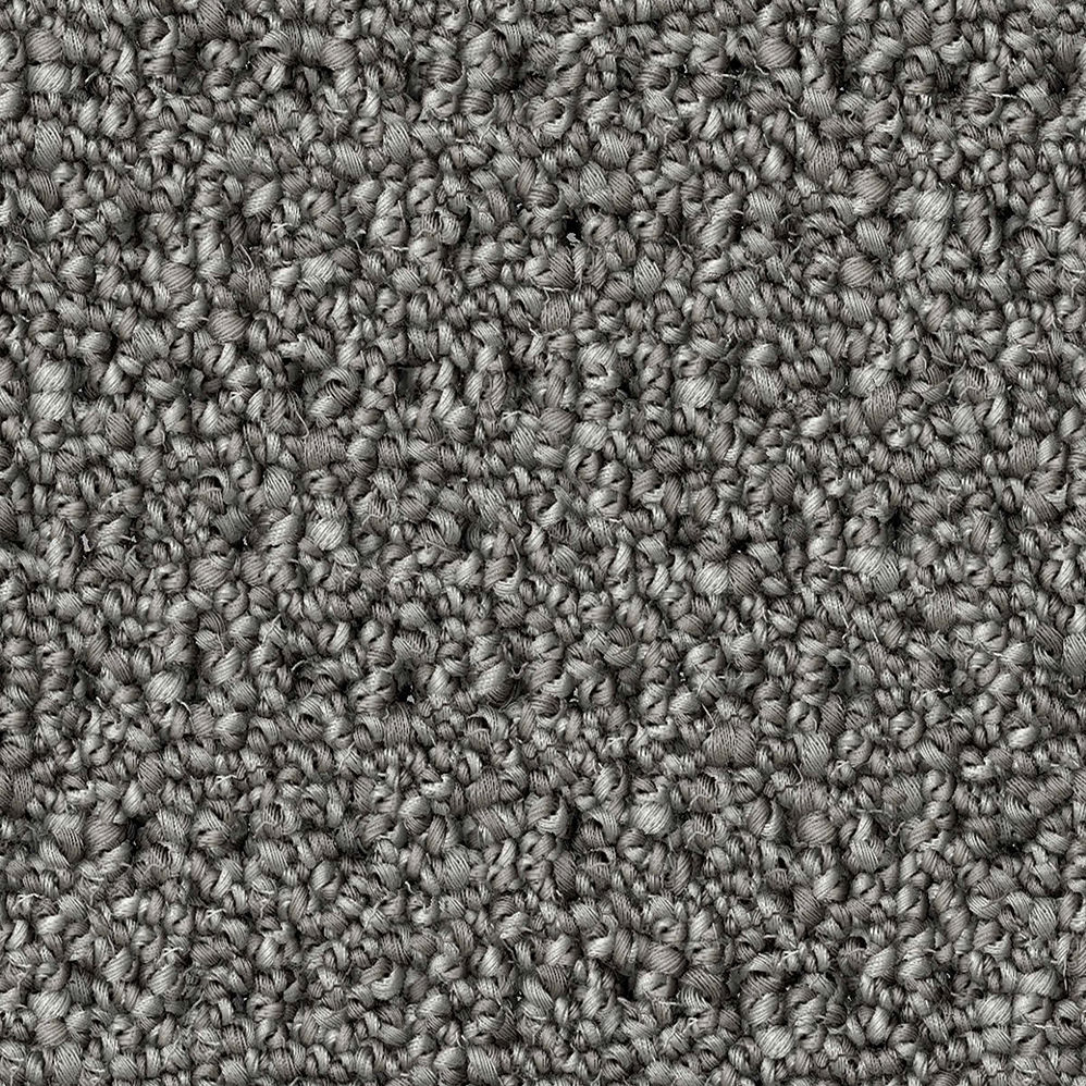 Close-up of gray textured carpet fibers