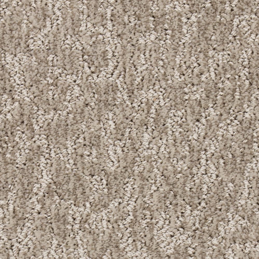 Close-up of beige plush carpet texture