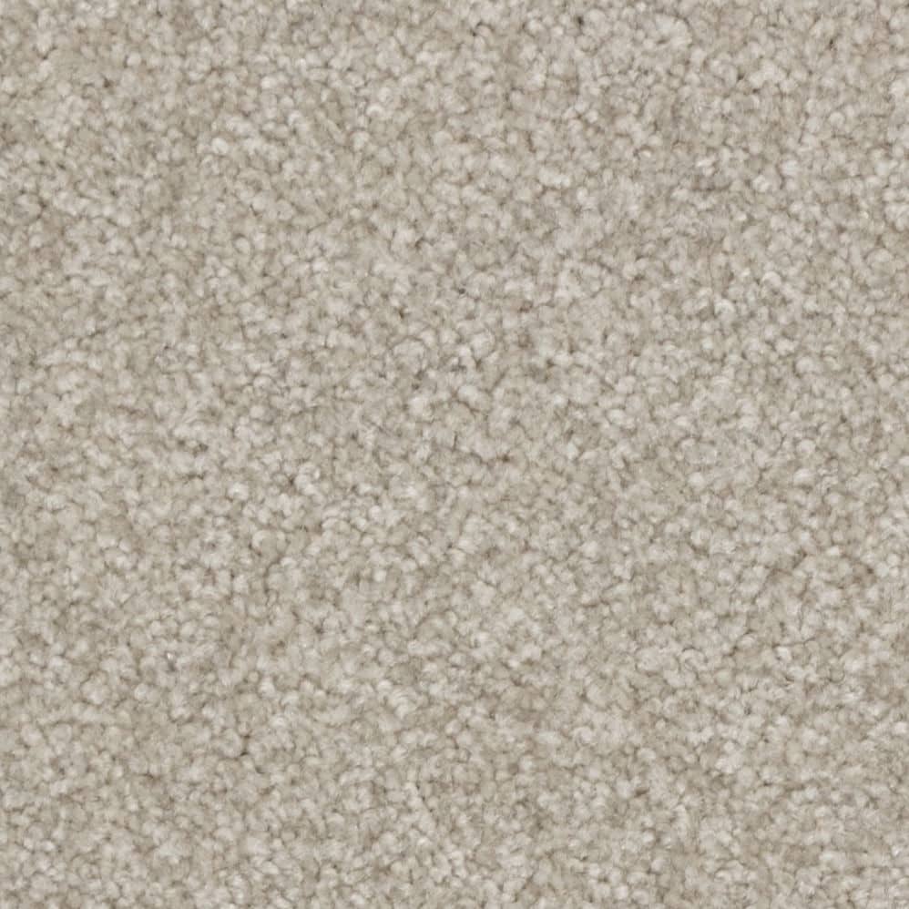 Close-up of beige textured carpet surface