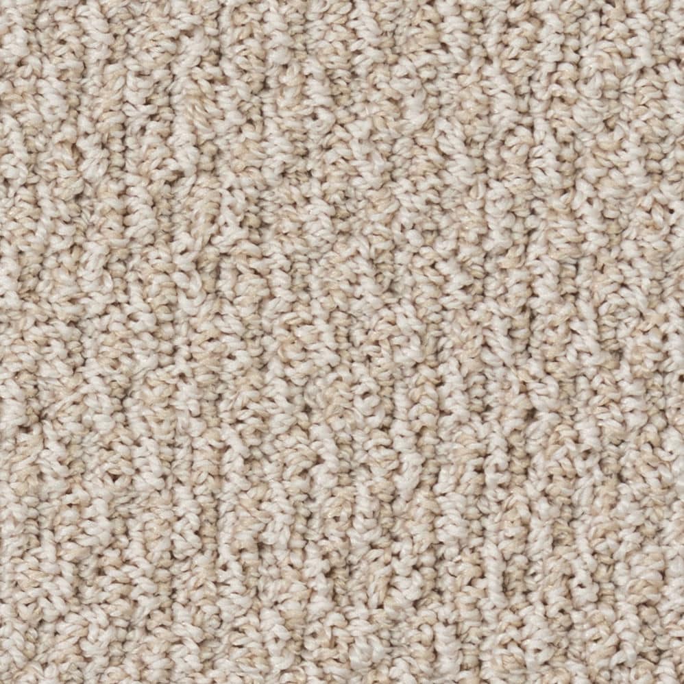Close-up of beige textured carpet surface