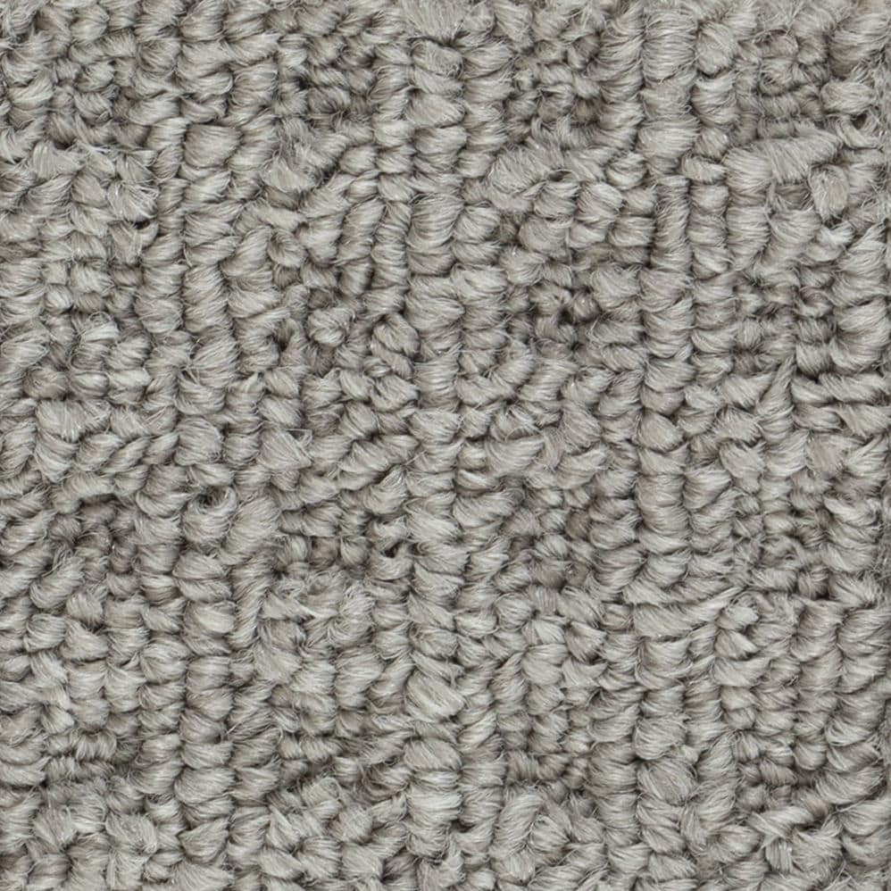 Close-up of gray textured carpet fibers