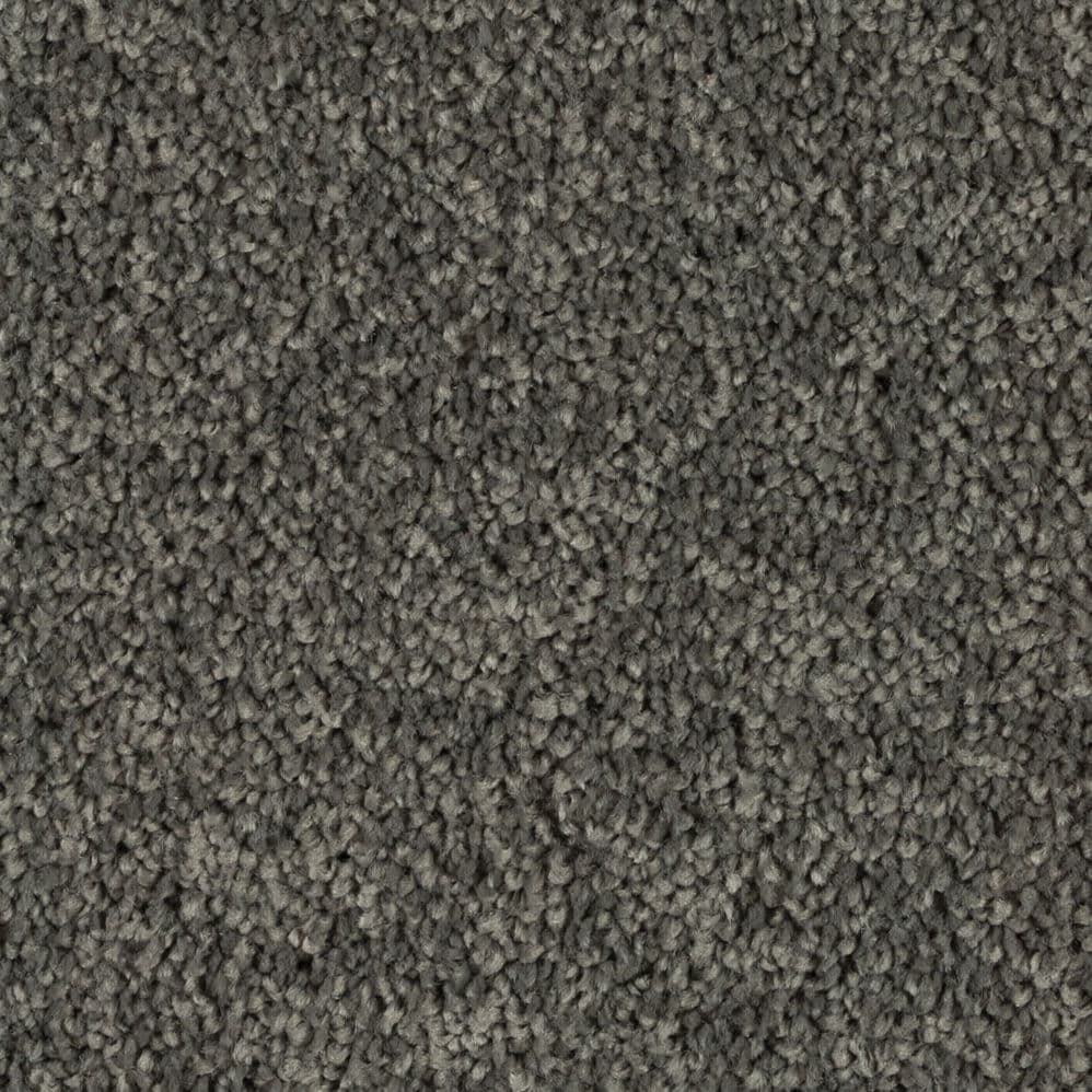 Close-up of gray textured carpet fibers