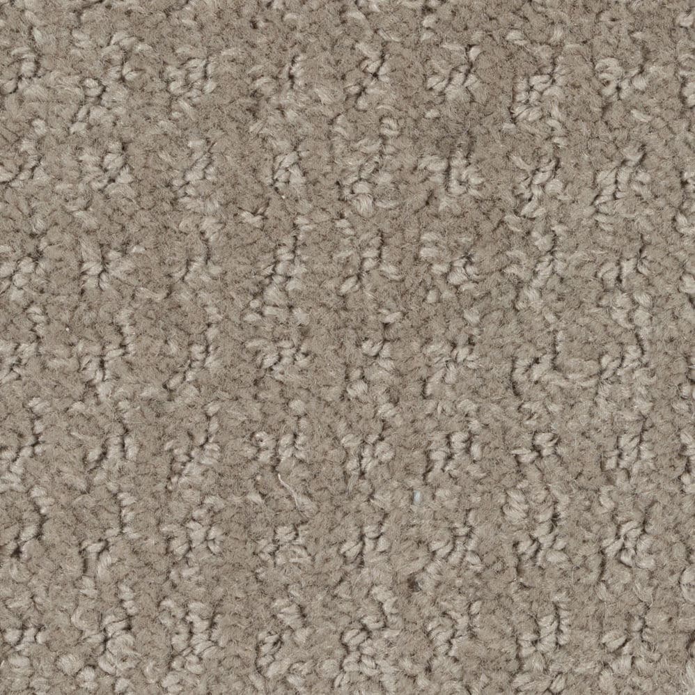 Close-up of beige textured carpet surface