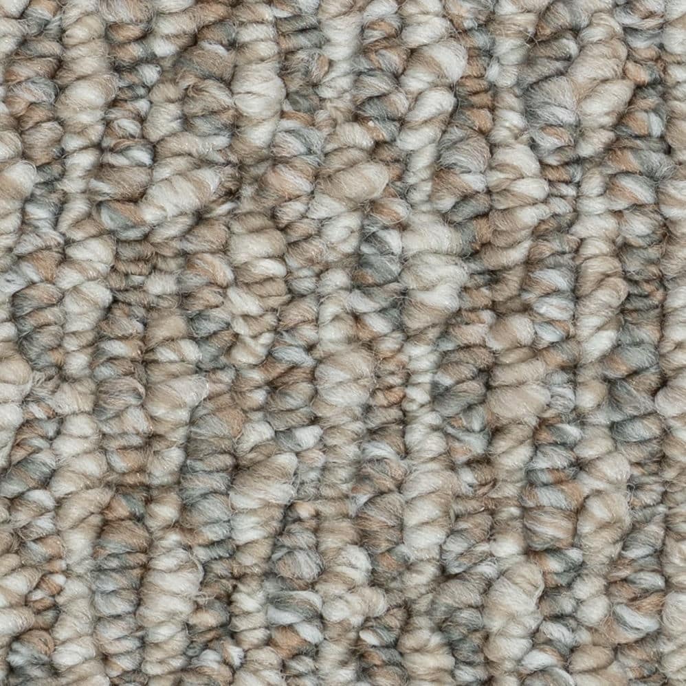 Close-up of textured gray and beige carpet fibers