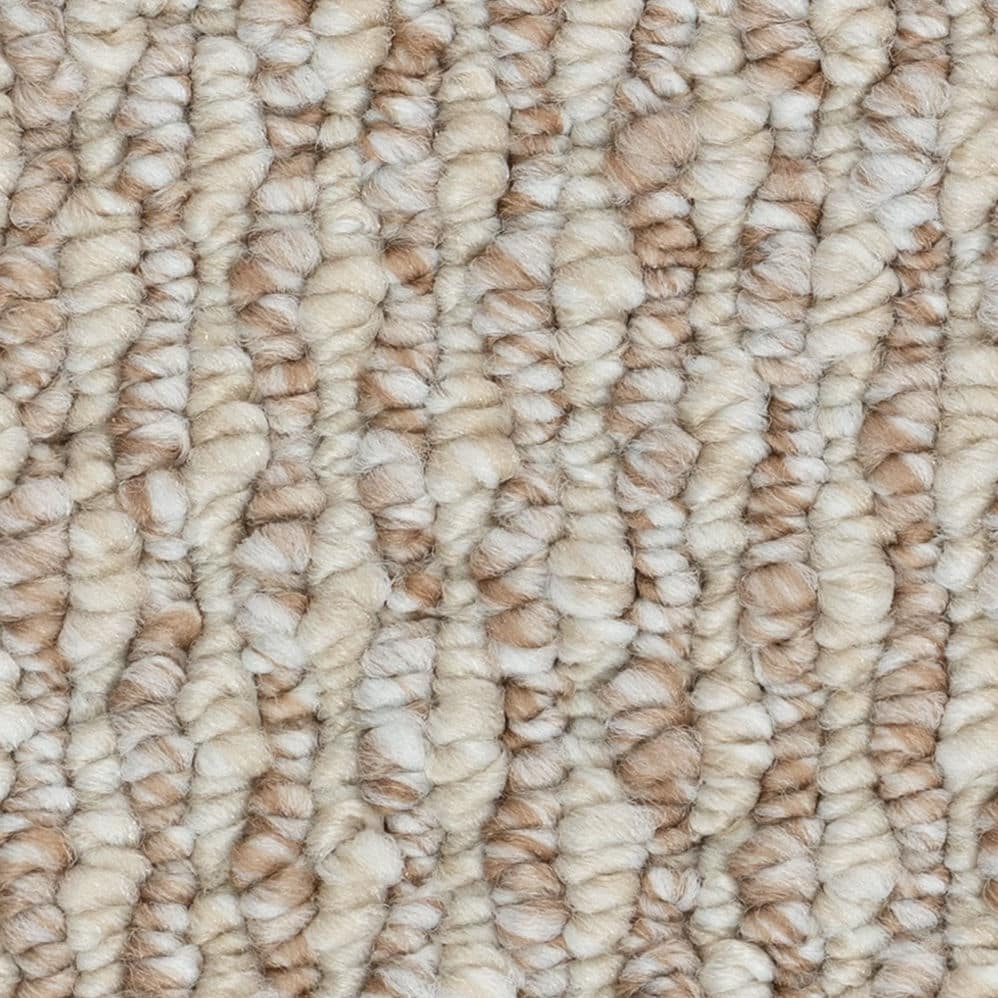 Close-up of textured beige carpet fibers