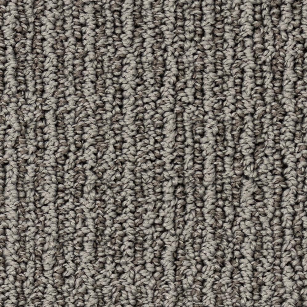 Close-up of textured gray carpet fibers