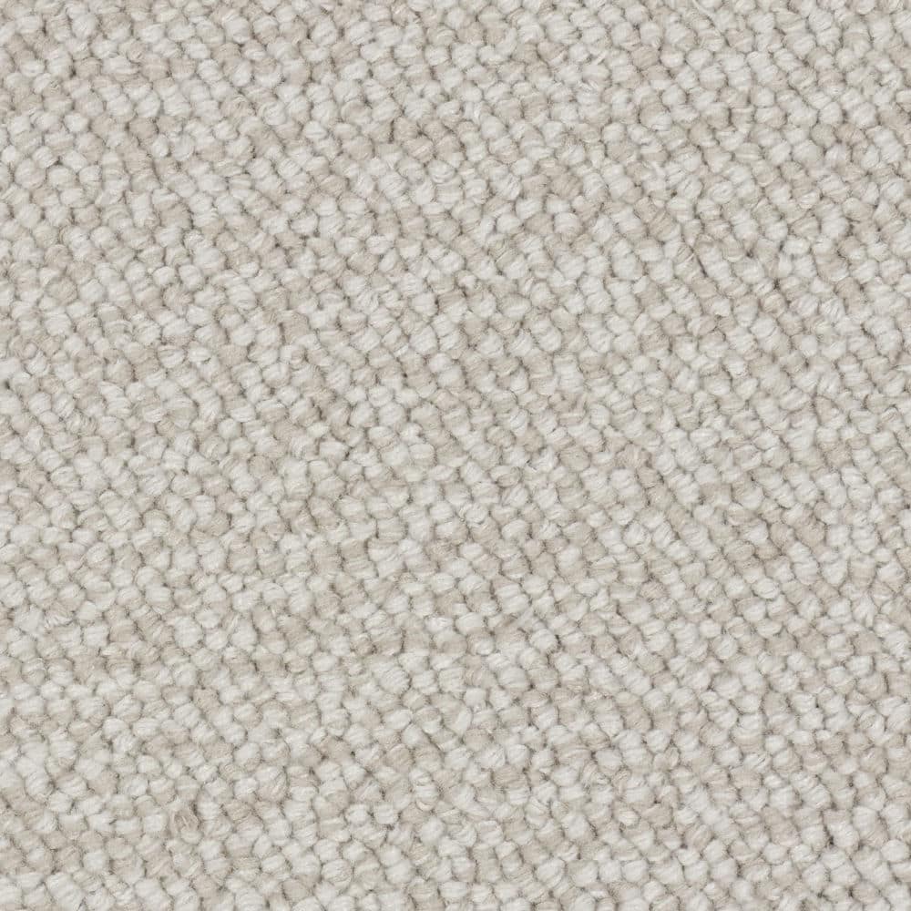 Close-up of light beige textured carpet
