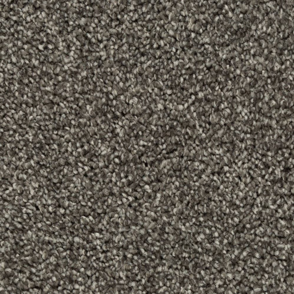 Close-up of gray textured carpet fibers