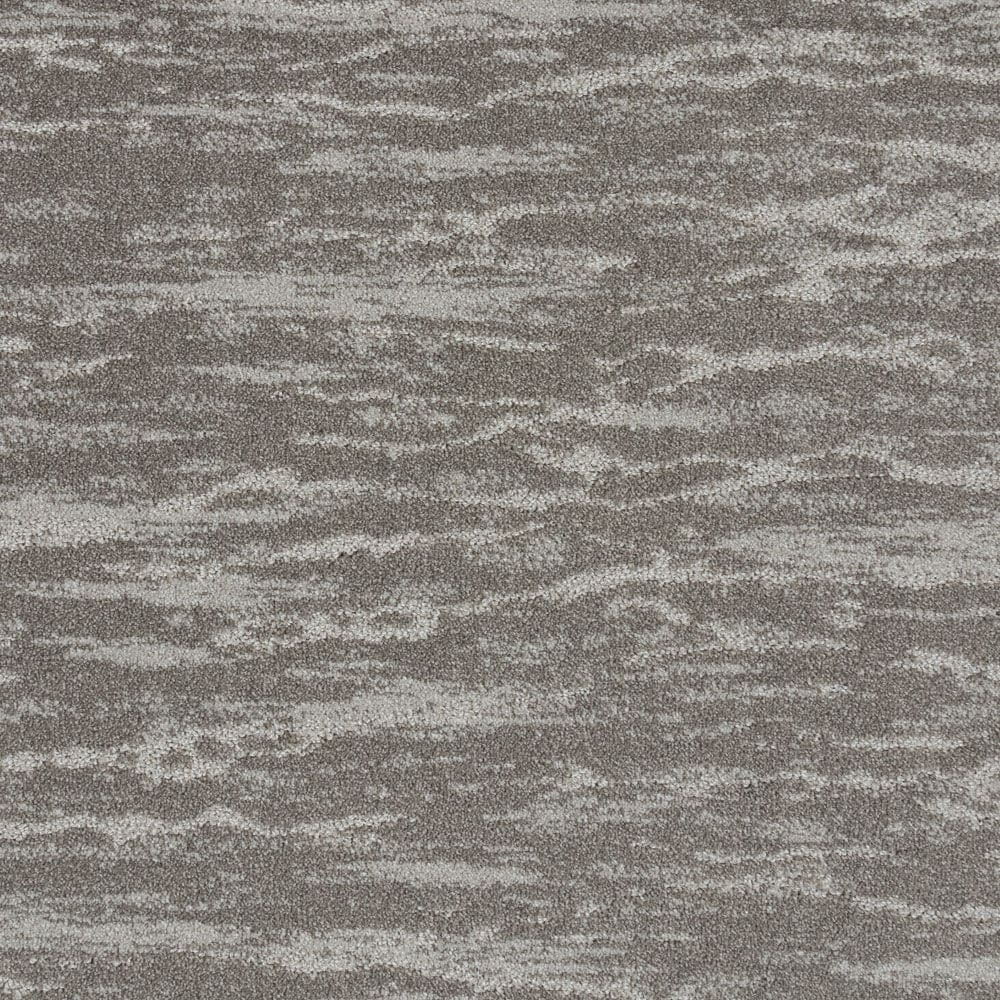 Gray textured carpet with subtle wavy pattern