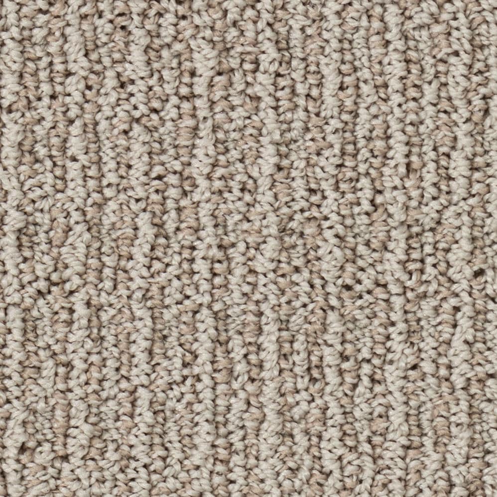 Close-up of beige textured carpet surface