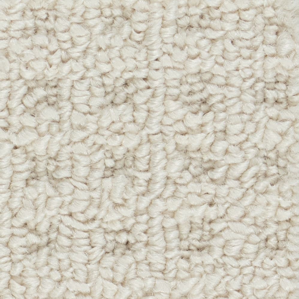 Close-up of beige textured carpet fibers