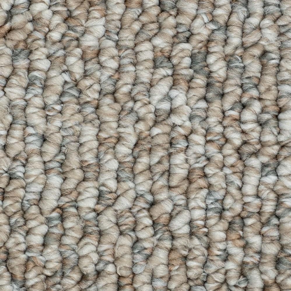 Close-up of textured beige loop carpet fibers