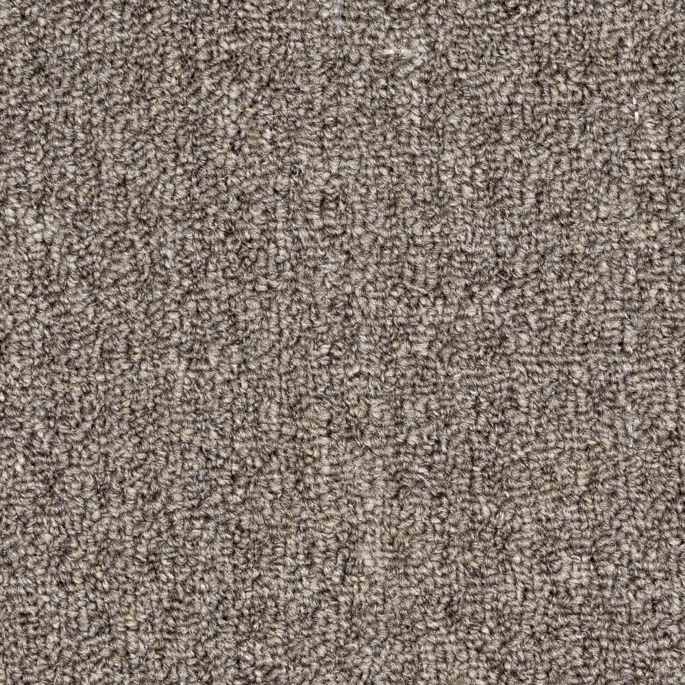 Close-up of beige textured carpet surface