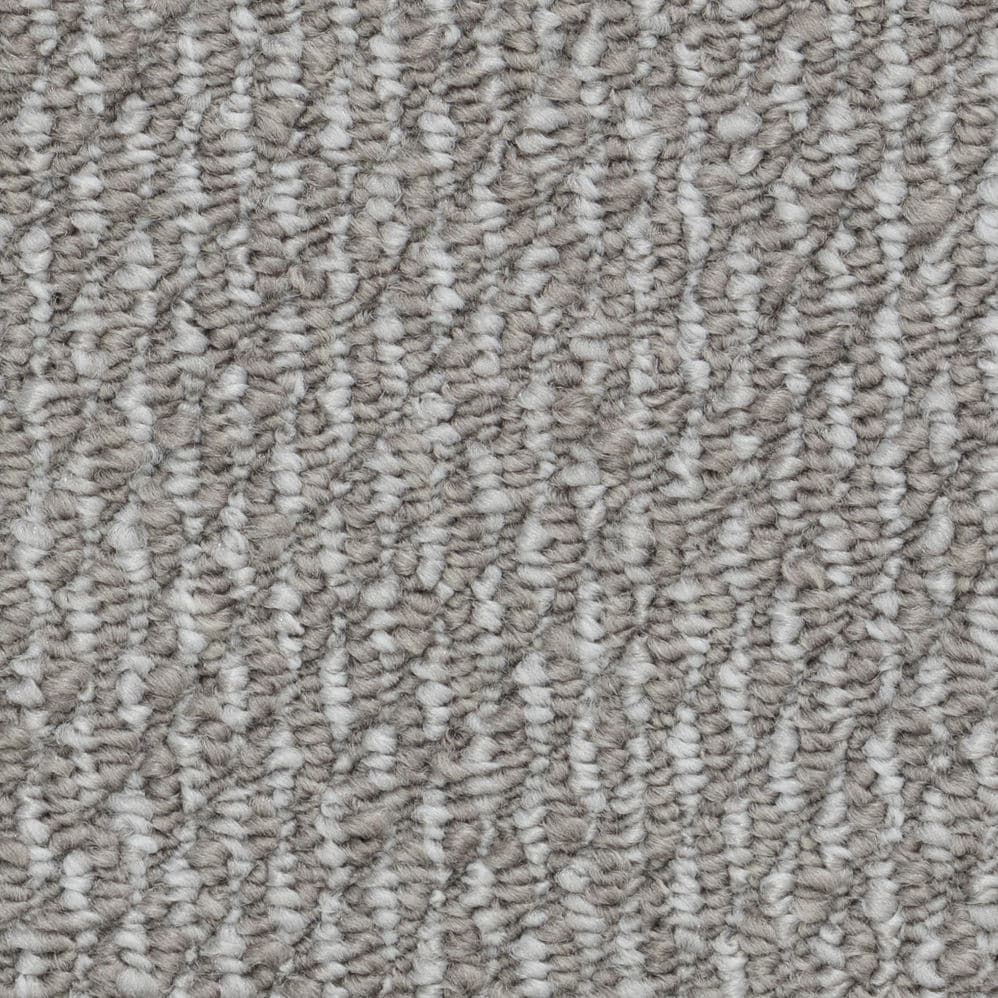 Close-up of textured gray carpet fibers