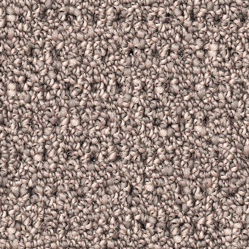 Close-up of beige loop pile carpet texture