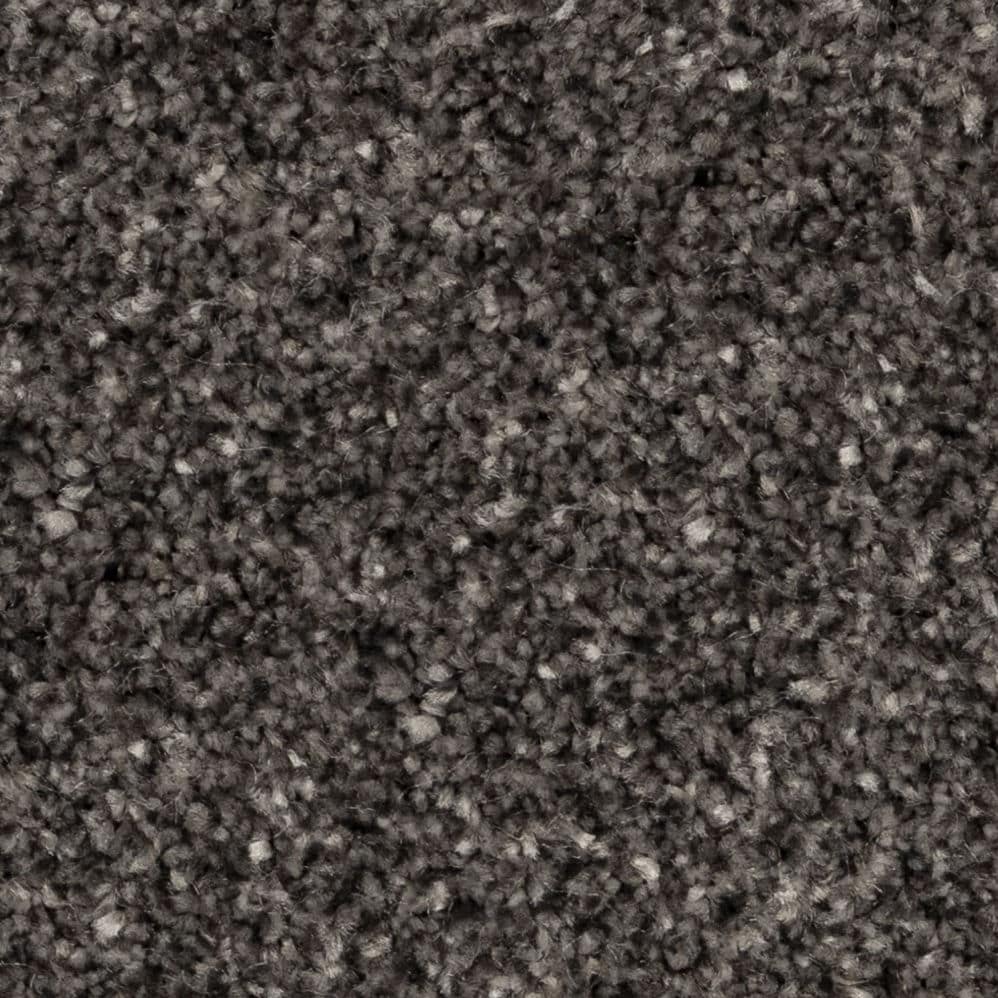 Close-up of gray textured carpet fibers