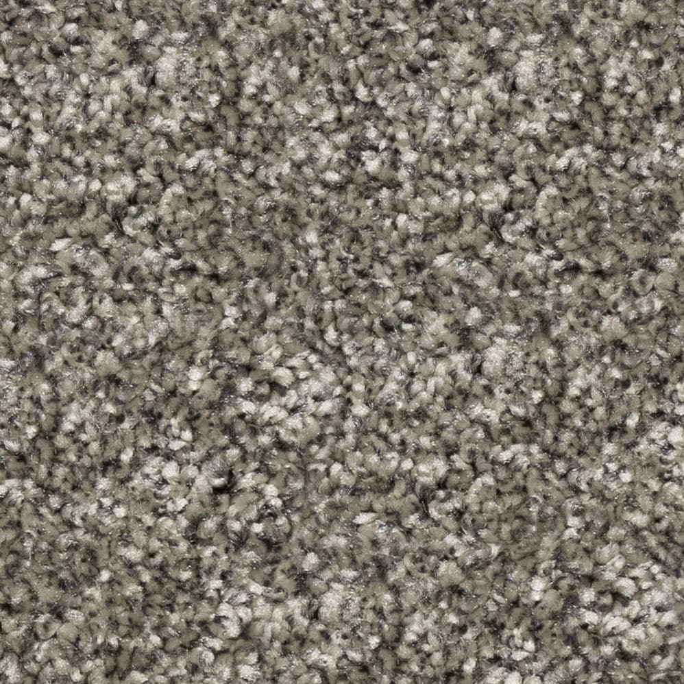 Close-up of gray textured carpet fibers