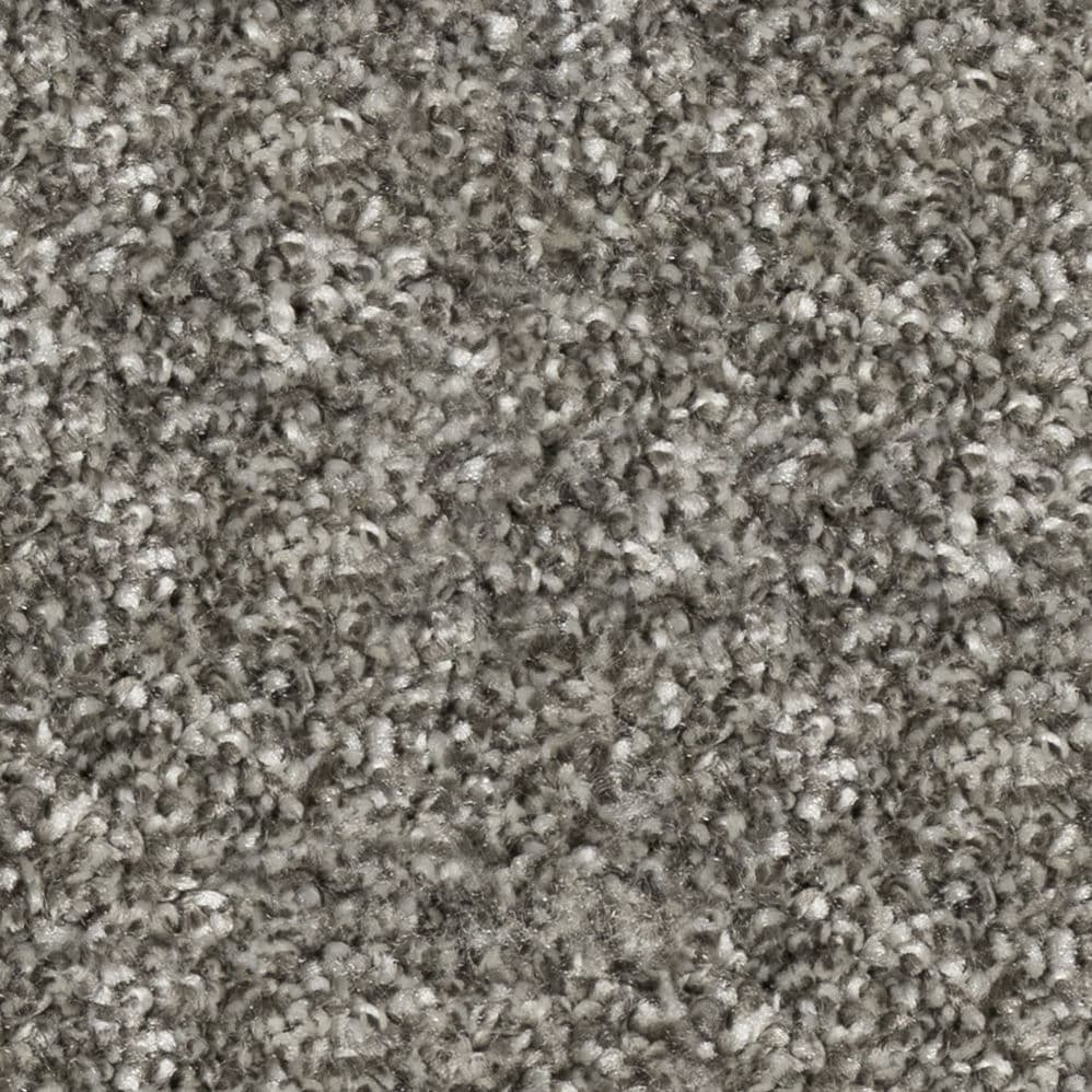 Close-up of gray textured carpet fibers