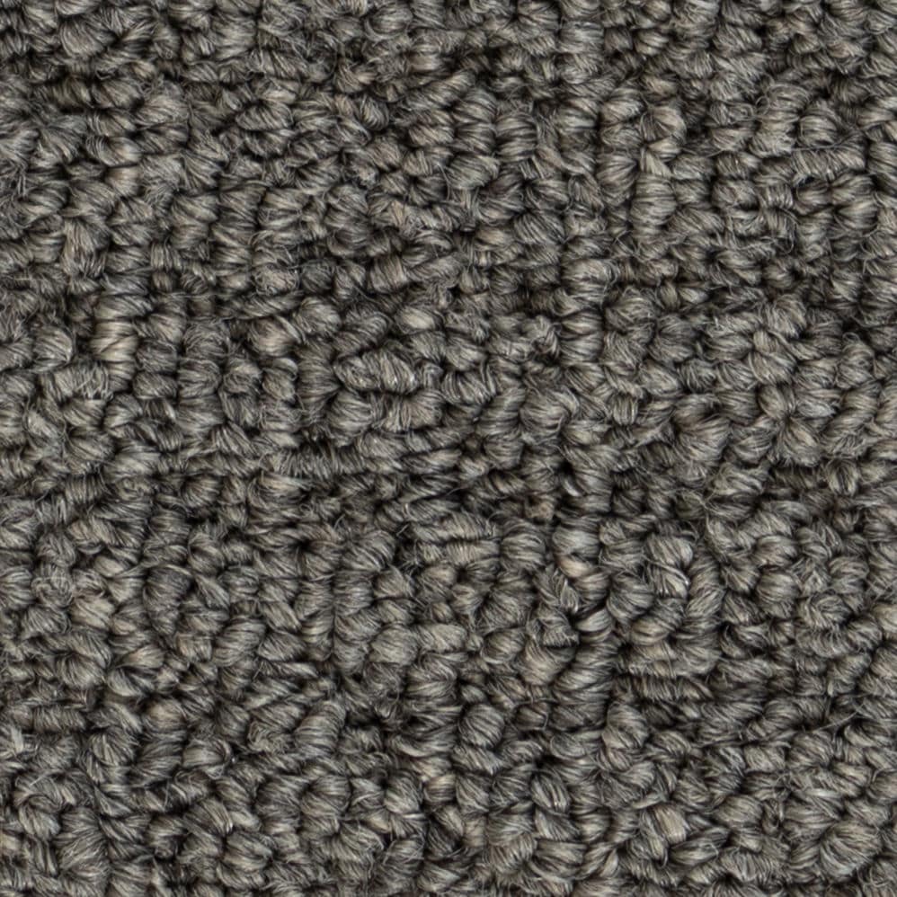 Close-up of gray textured carpet fibers