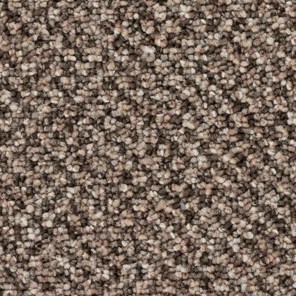 Close-up of brown textured carpet fibers