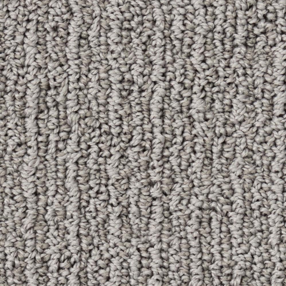 Close-up of textured gray carpet fibers