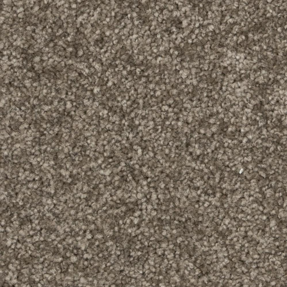 Close-up of brown textured carpet surface