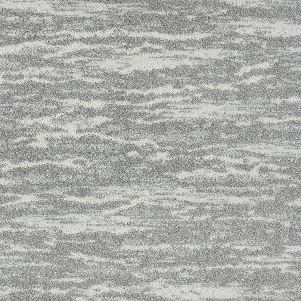 Gray textured surface resembling ocean waves
