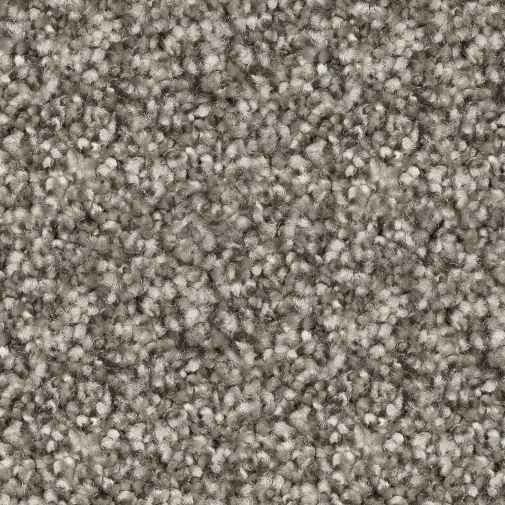 Close-up of gray textured carpet fibers