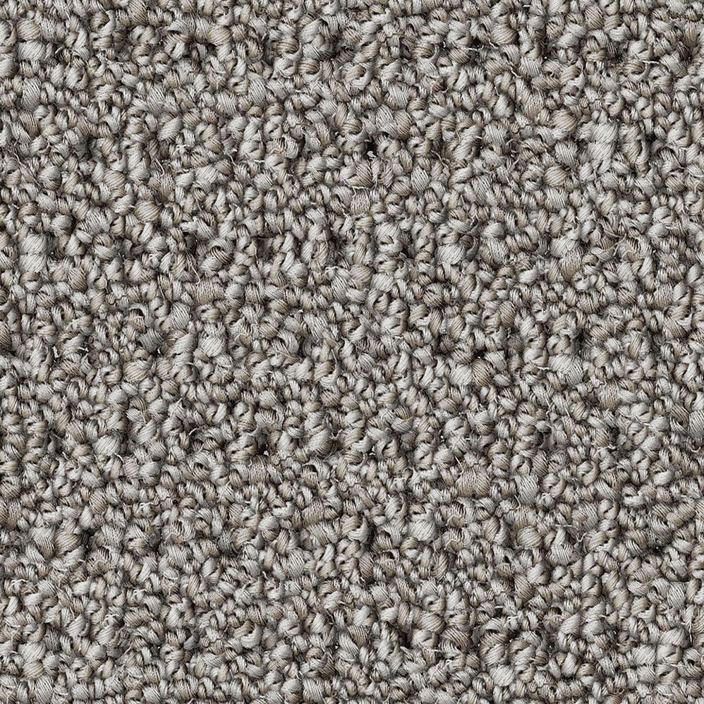 Close-up of gray textured carpet fibers