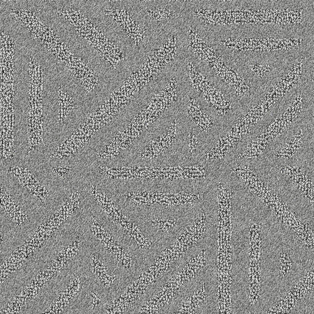 Gray geometric patterned carpet texture close-up