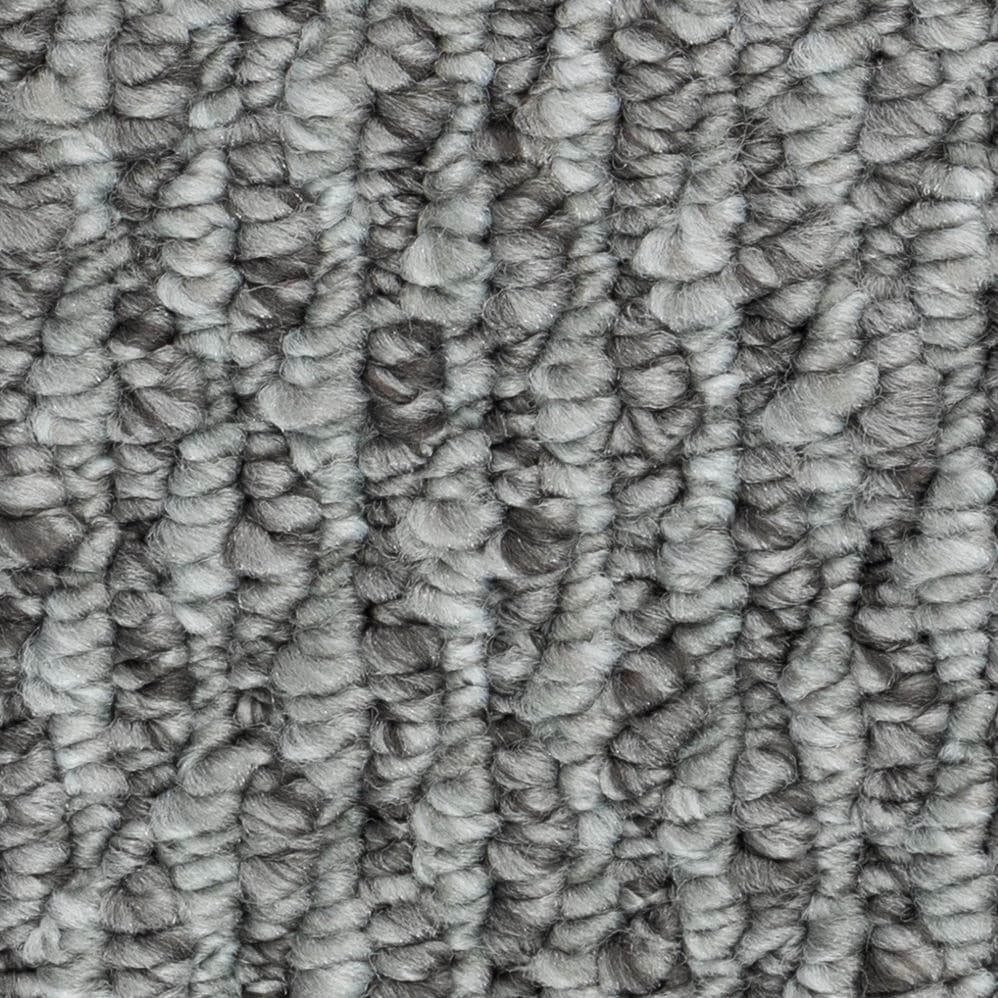 Close-up of gray textured carpet fibers