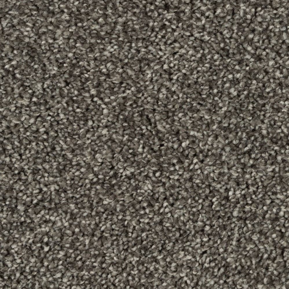Close-up of gray textured carpet fibers