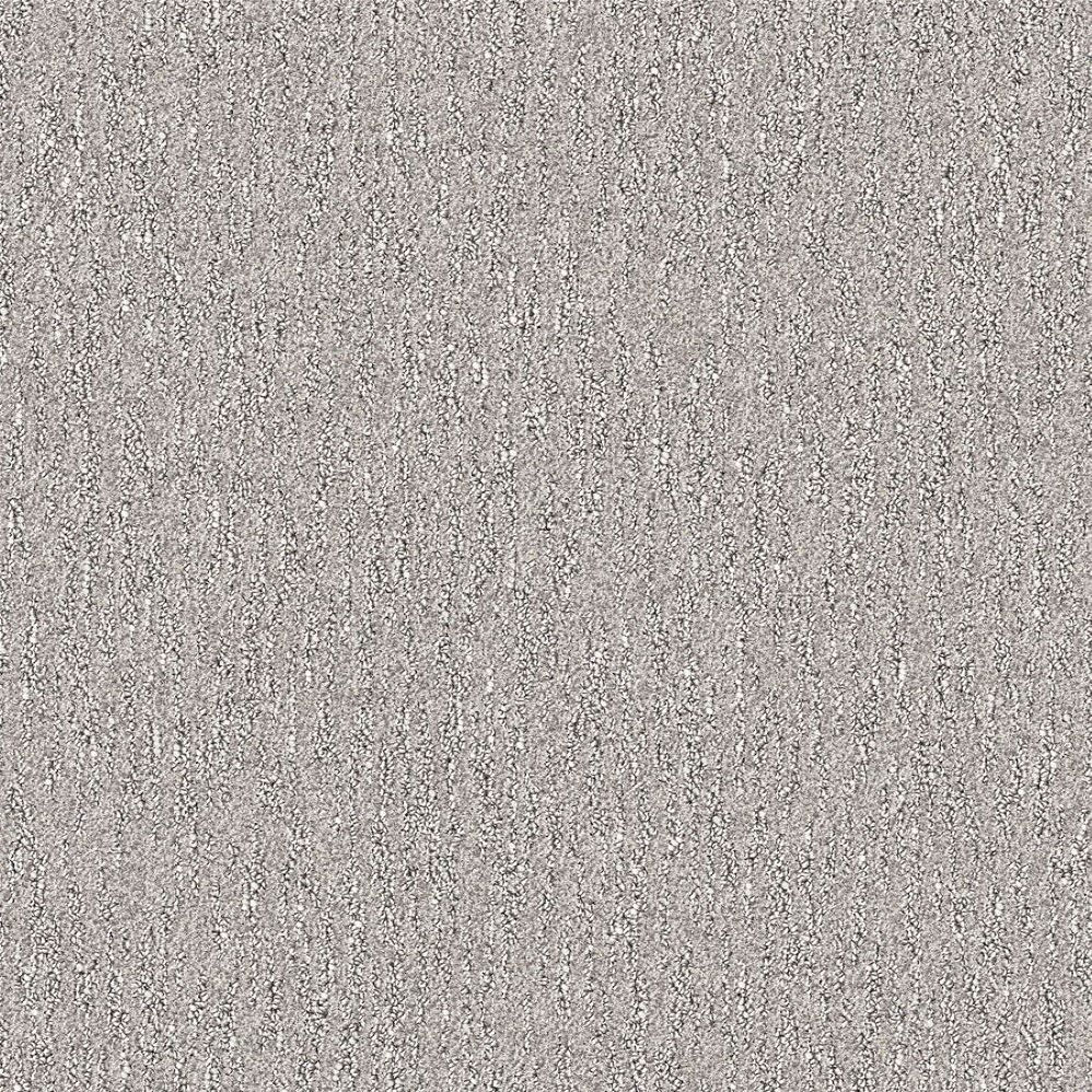 Light gray textured carpet with subtle vertical pattern
