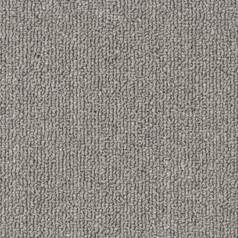 Close-up of gray textured carpet surface