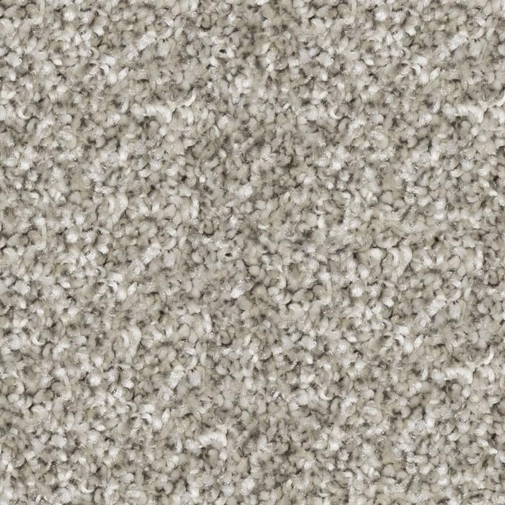 Close-up of light gray textured carpet fibers