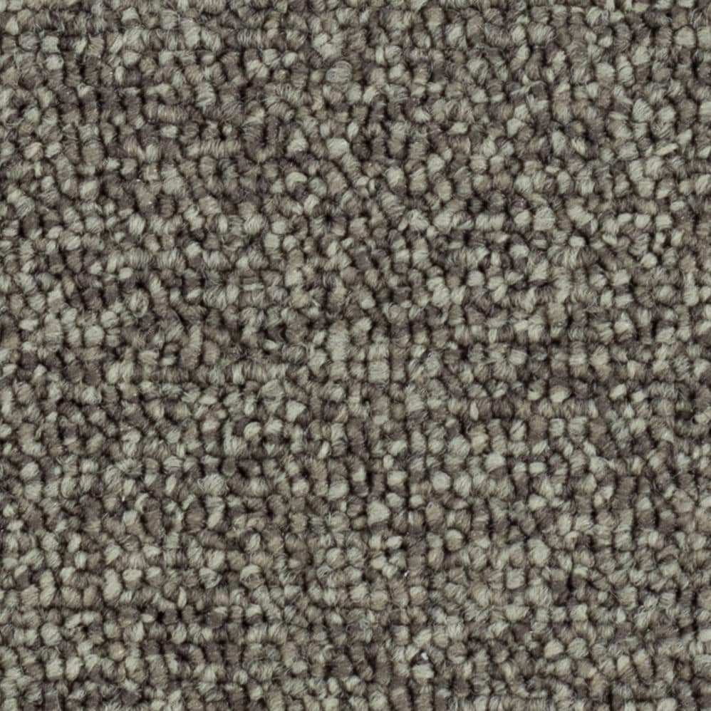Close-up of gray textured carpet fibers