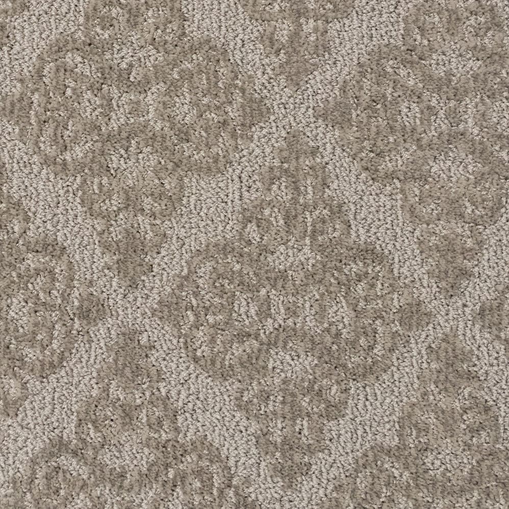 Beige patterned carpet texture close-up