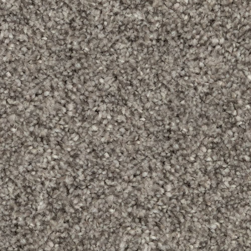 Close-up of gray textured carpet fibers