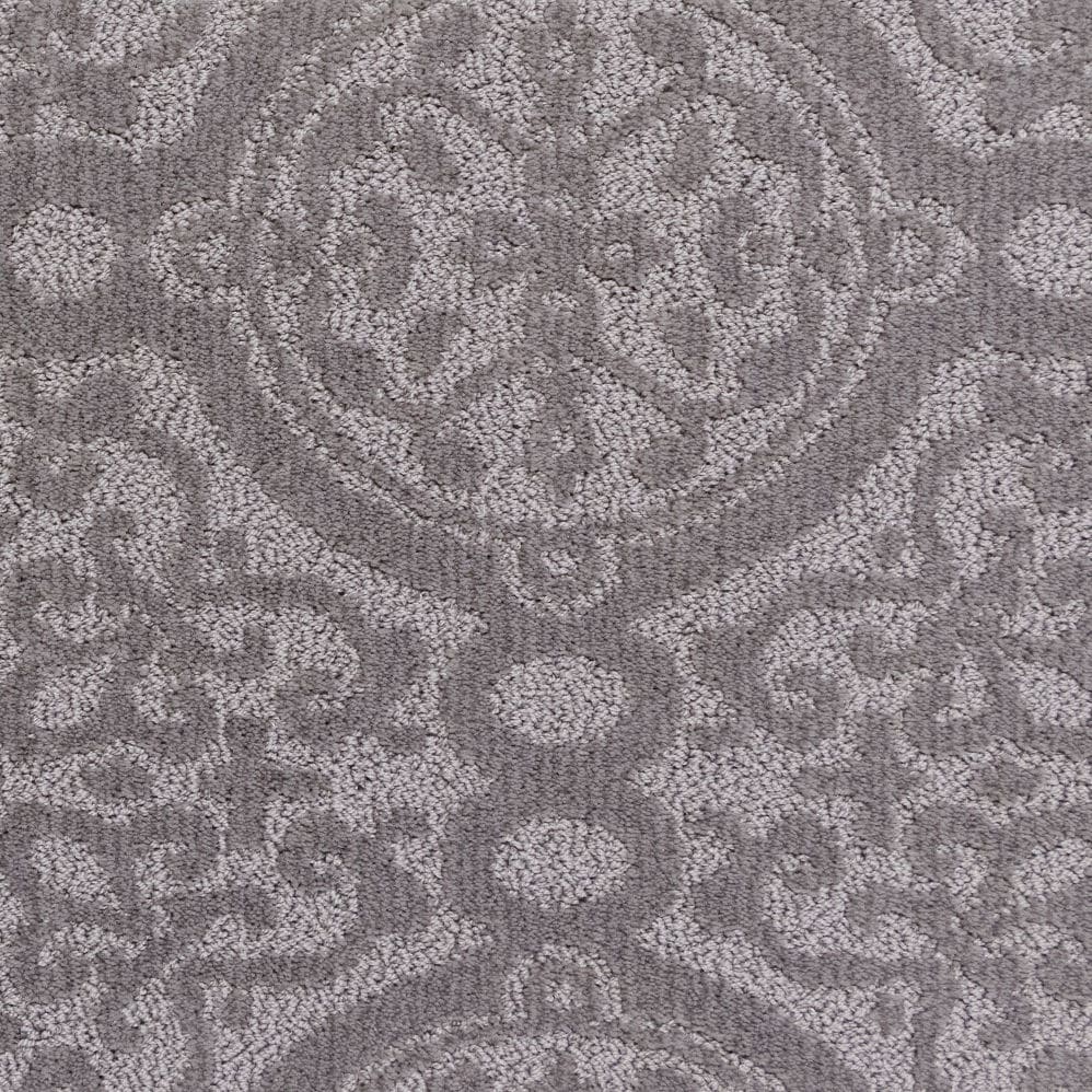Gray patterned carpet with floral medallion design