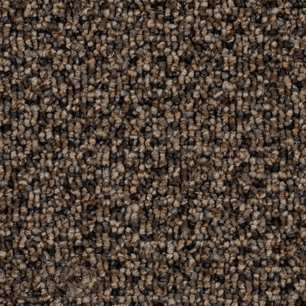 Close-up of brown textured carpet fibers